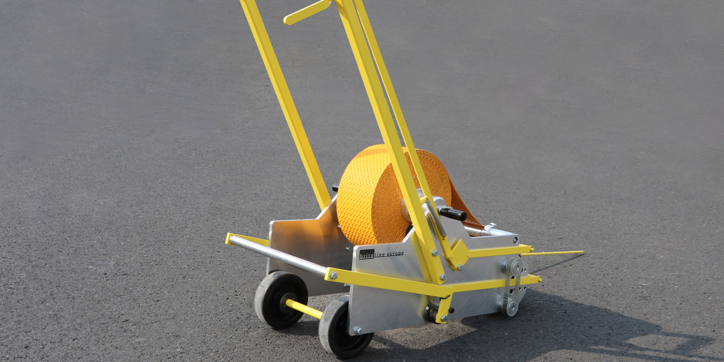 Road marking film laying device | Brite-Line Europe